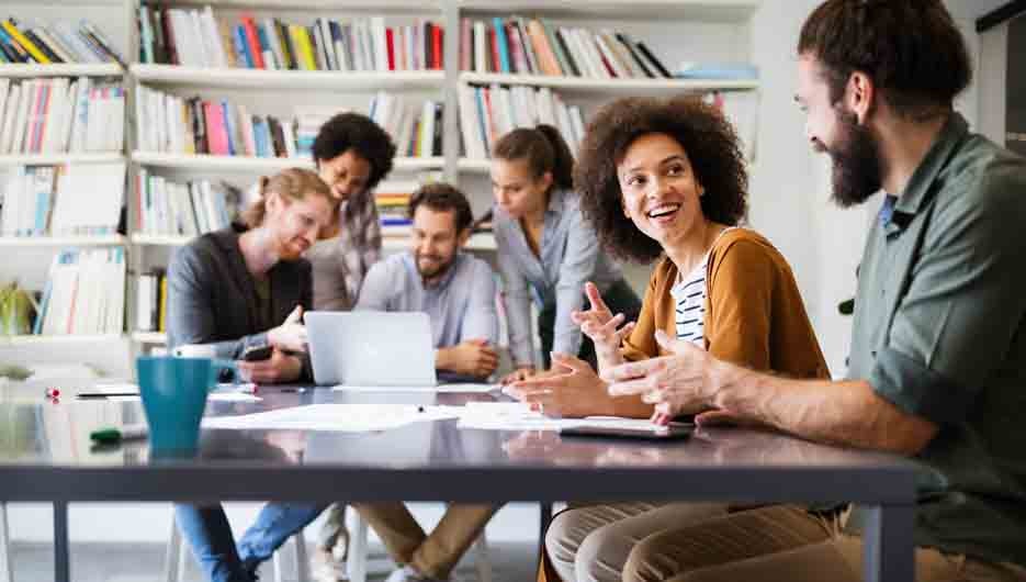 Collaboration and analysis by business people working in office
